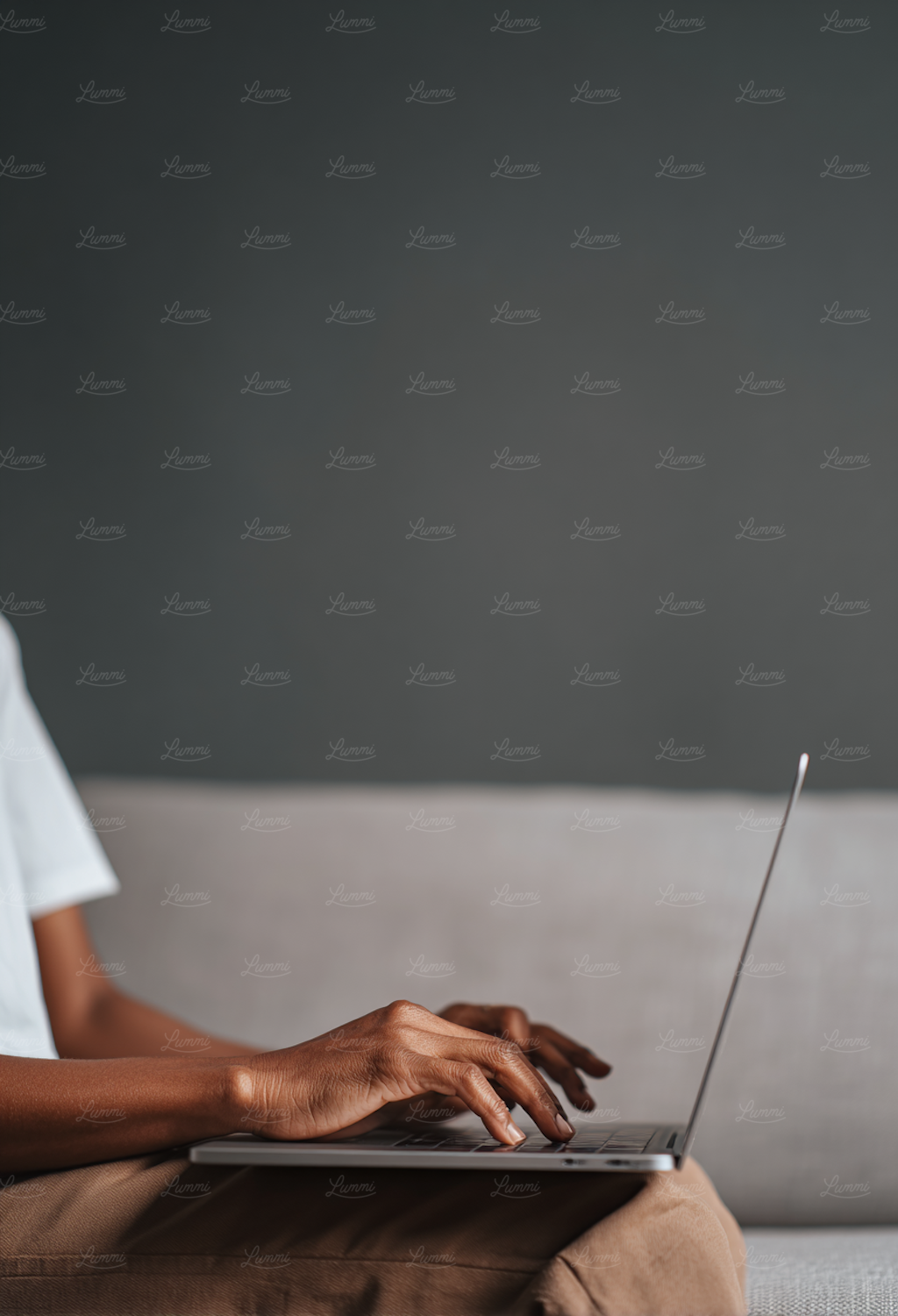 A remote salesperson effectively balances work and study, engaged in an online learning session on their laptop, fitting education into a busy schedule.
